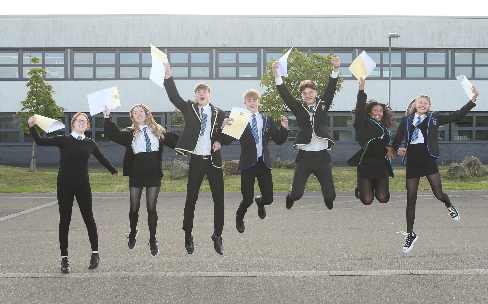 Pupils jumping for joy