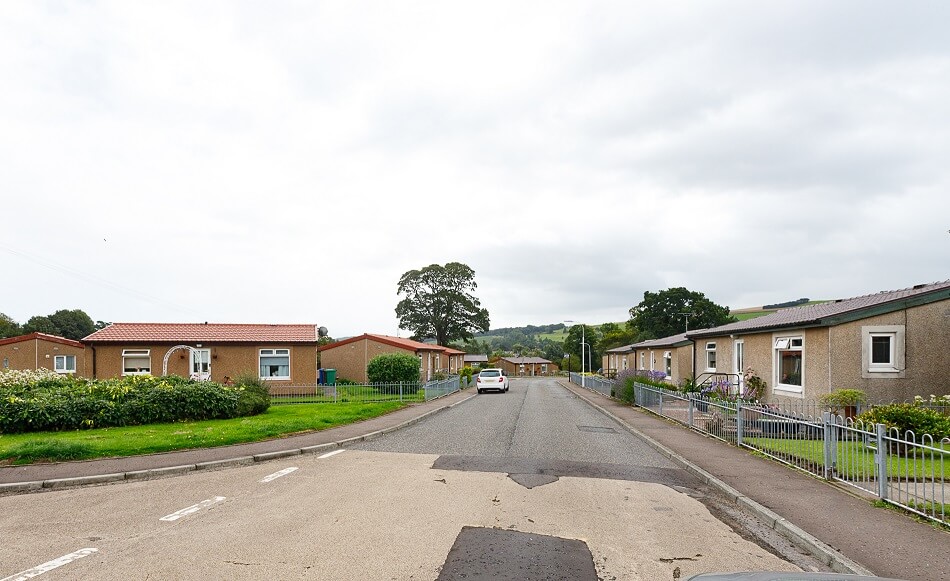 Street view of Blalowan Park, showing kerbside parking areas.