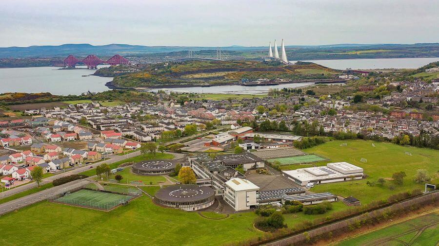 Aerial photo of Inverkeithing High Street with the Forth and bridges in the background 