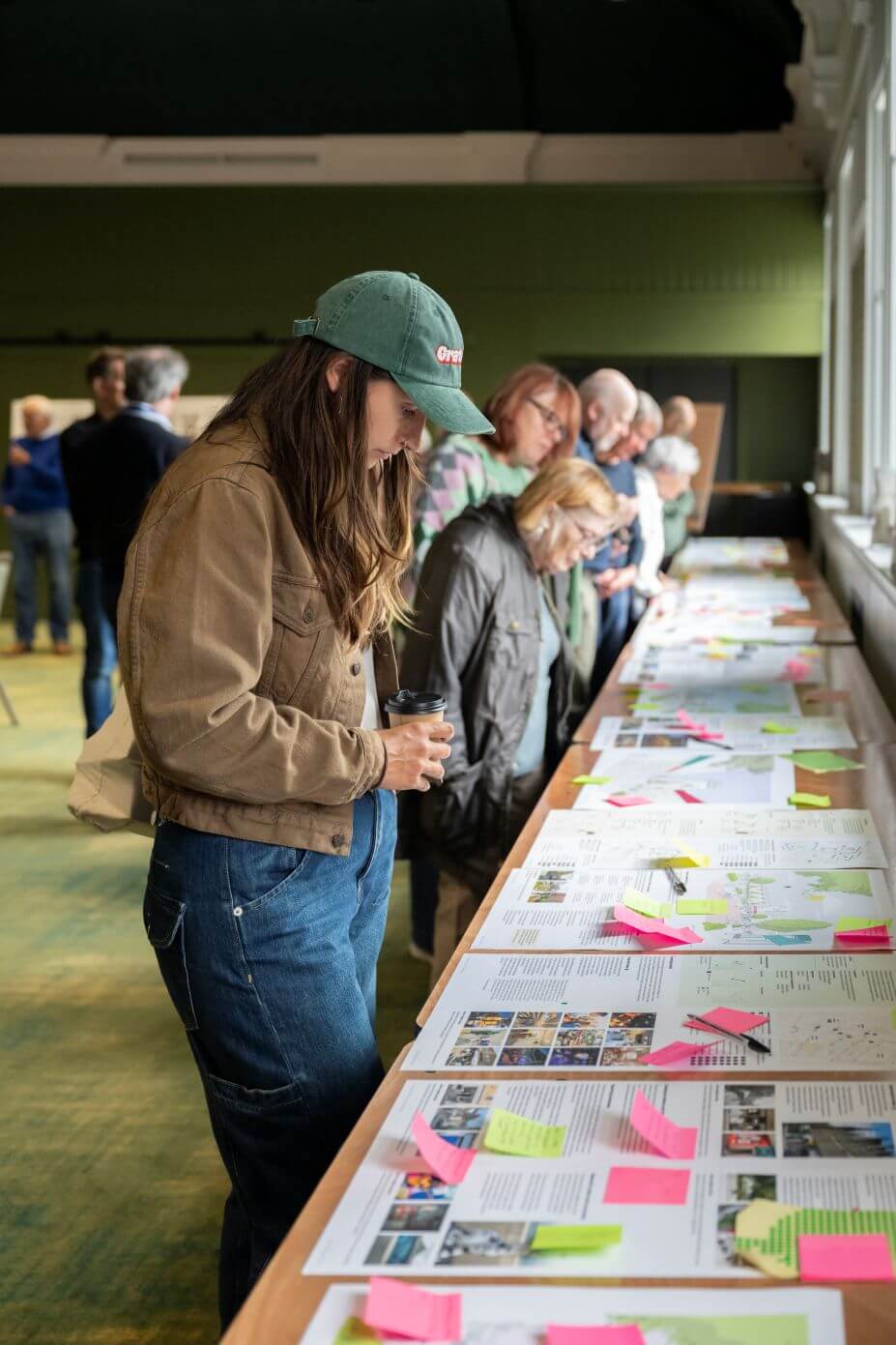 People standing reading information and having their say