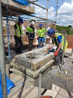 Four tradesmen working on Inverkeithing's Town House