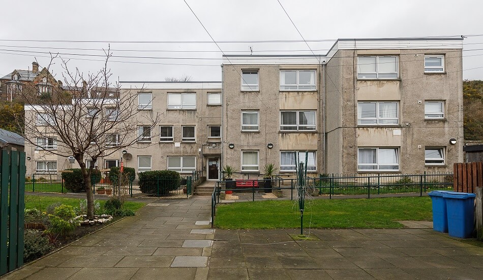 Exterior of Allan Court, with extensive pathways and walking area