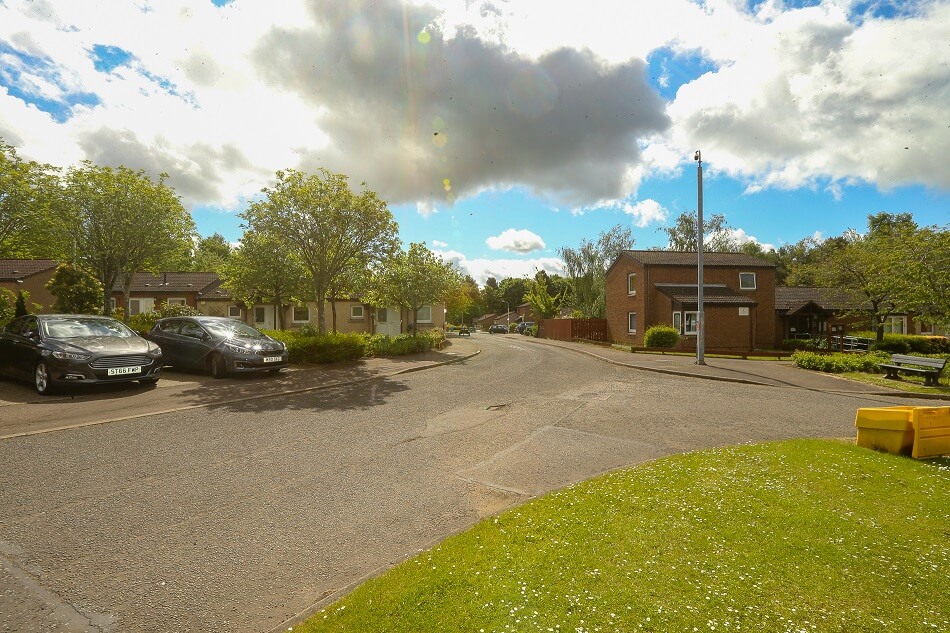 Image of exterior of Strathyre Place, including parking facilities