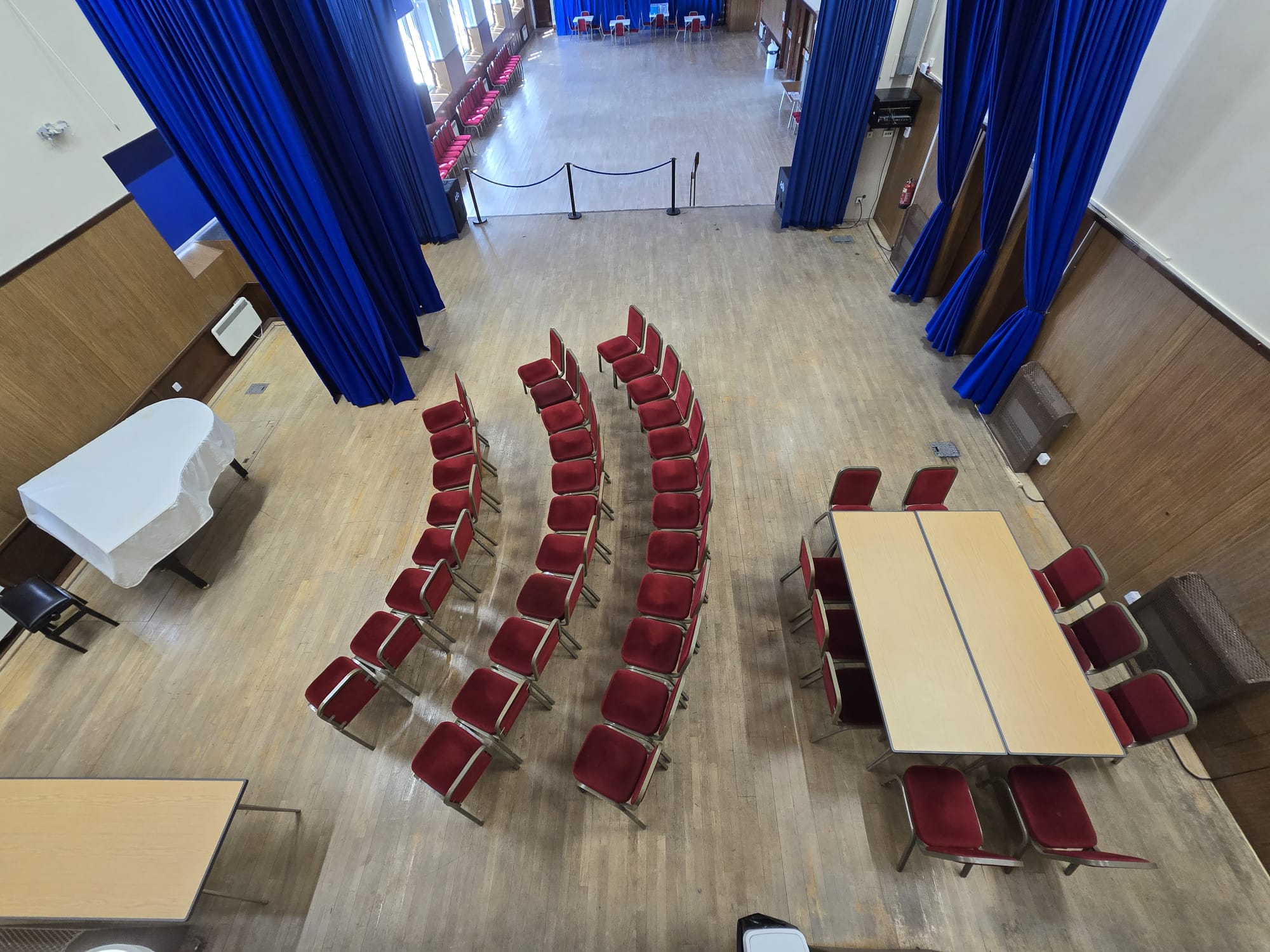 Birds eye view of stage area, with seating arranged