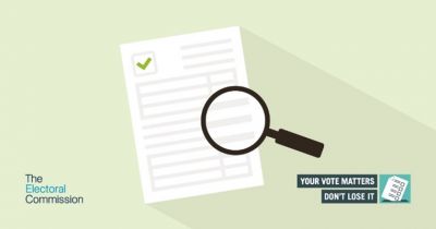 An illustration of a document with a green checkmark and text lines, magnified by a magnifying glass. The Electoral Commission logo appears in the bottom left. On the right, a message reads 'YOUR VOTE MATTERS DON'T LOSE IT' next to a ballot paper icon