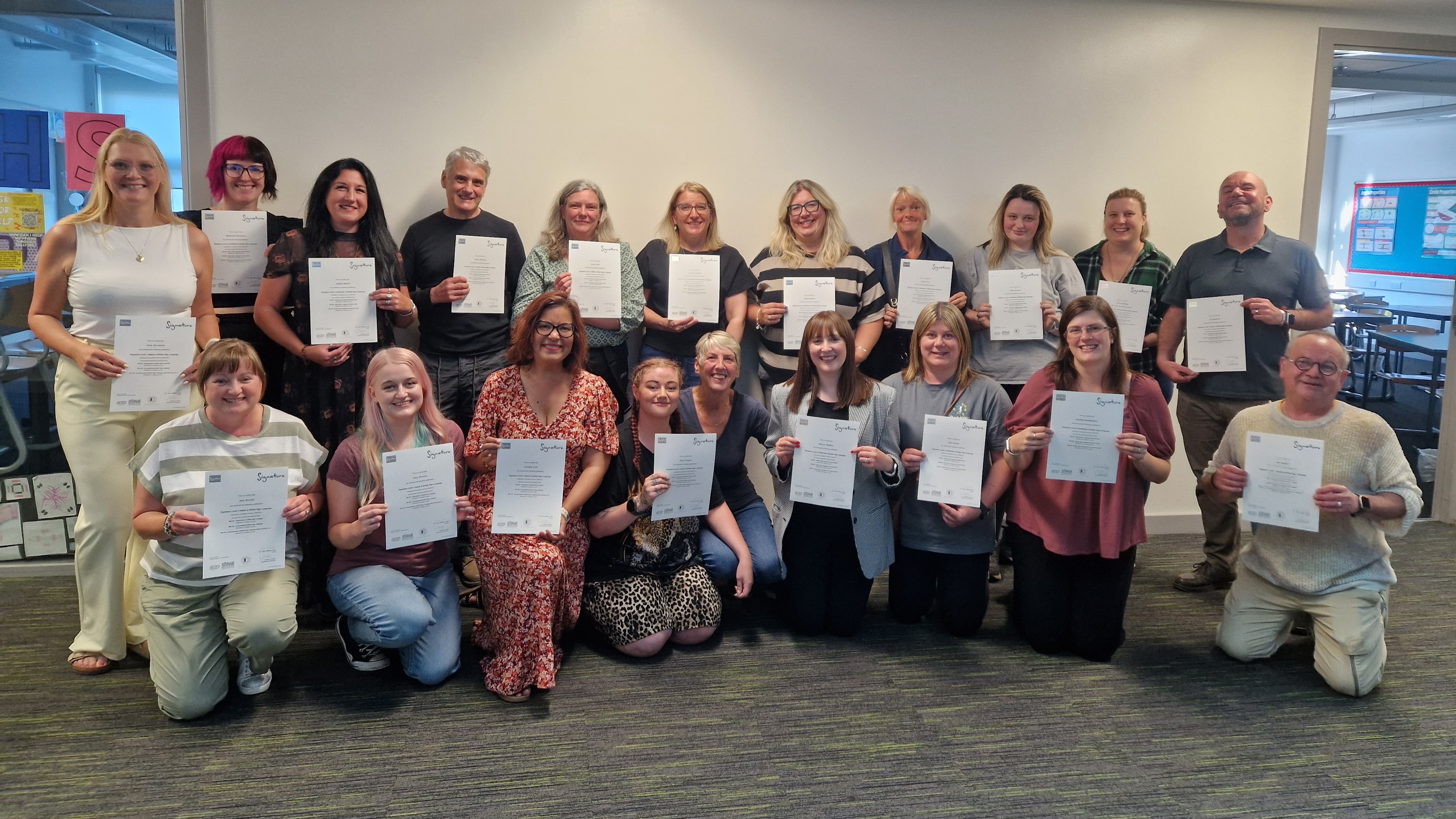 BSL learners receiving certificates